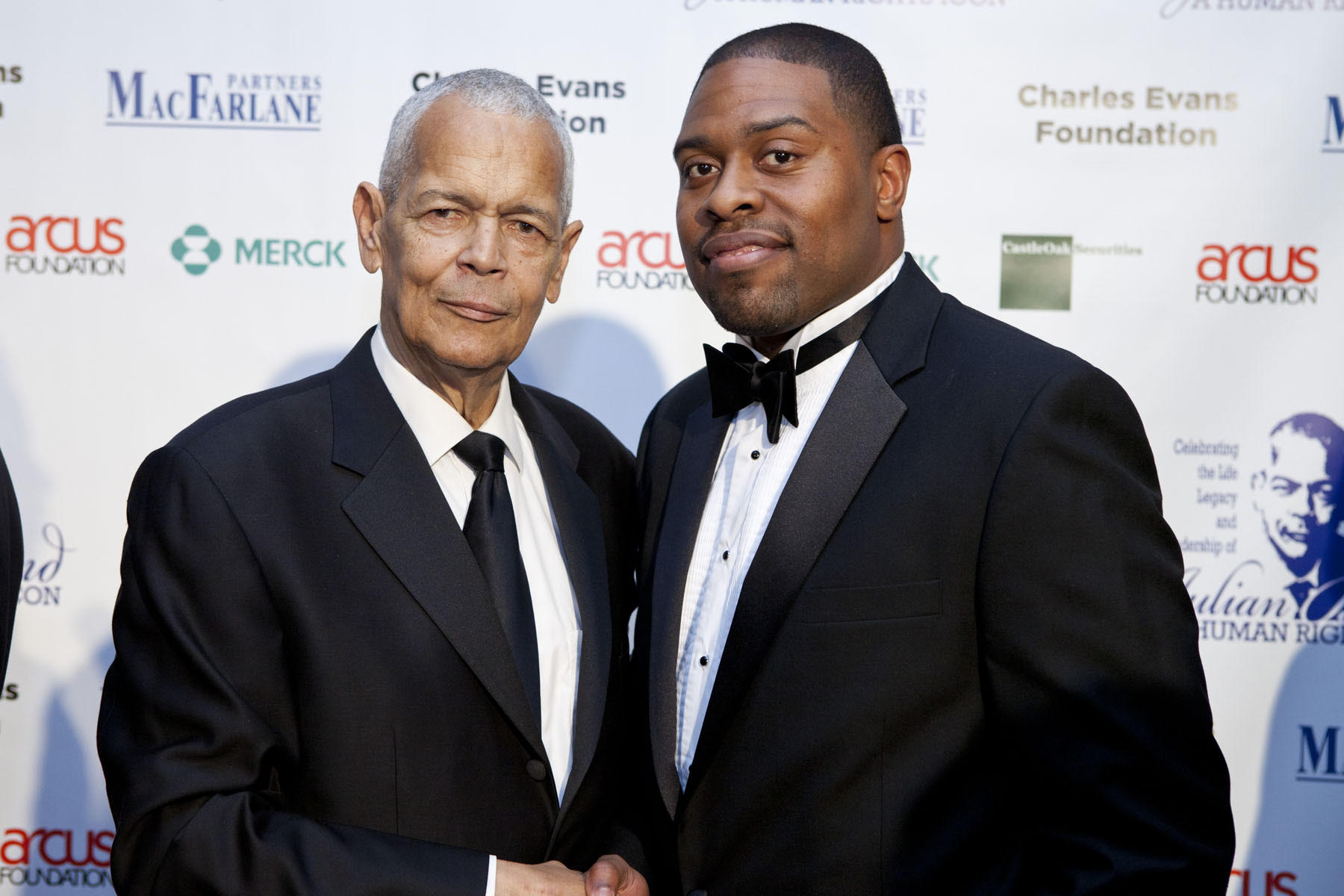 Julian Bond (left) and Timothy Lovelace during the Julian Bond Gala, a 2012 retirement event and fundraiser for the Julian Bond Chair at the University of Virginia. 
