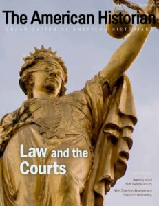 The cover of the November issue of The American Historian featuring a statue of blind justice.