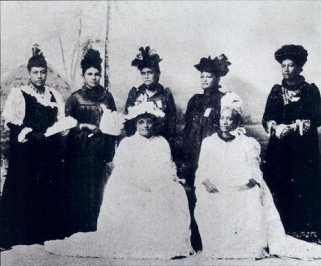 A group of seven women stand for a photograph.