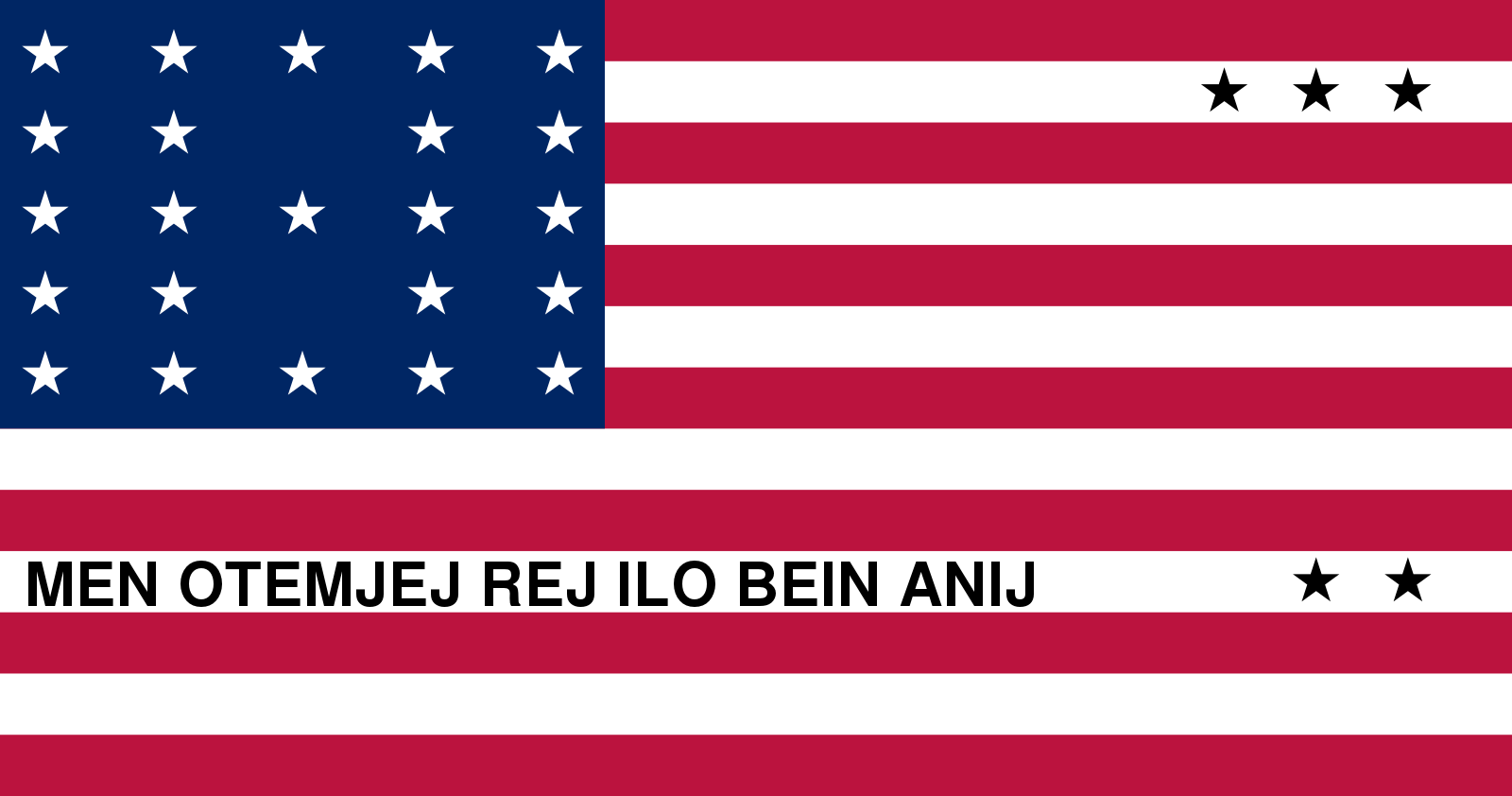 Flag with red and white stripes, and black stars; a blue square in the top left with white stars; and the words "MEN OTEMJEJ REJ ILO BEIN ANIJ."